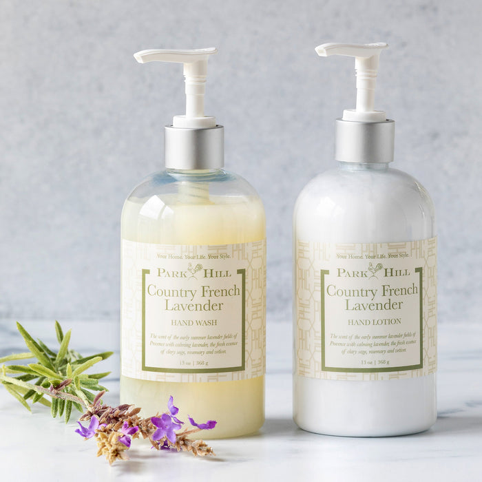 Two bottles of Park Hill Country French Lavender hand wash and lotion on a light background.