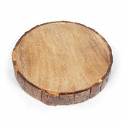 Underside of Round wooden tableware with natural edge on a white background
