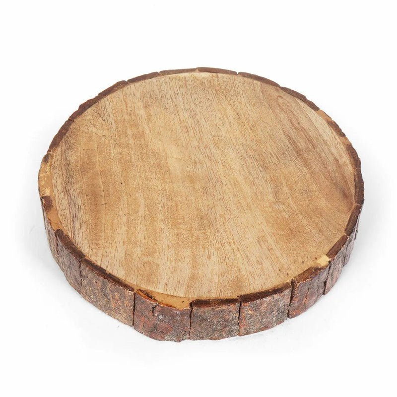 Underside of Round wooden tableware with natural edge on a white background