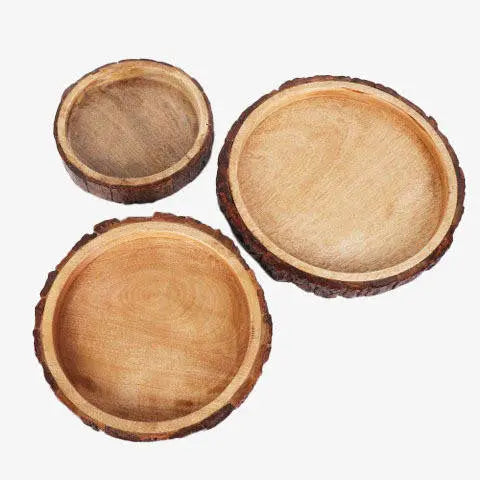Three wooden bowls with a natural finish on a white background
