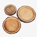 Three wooden bowls with a natural finish on a white background