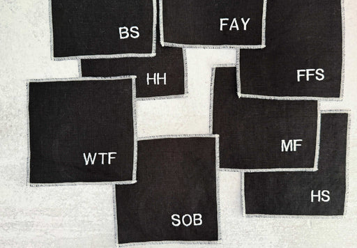 Sweary Cocktail Coasters in Black and White, set of eight Coasters from Kitchen Supply